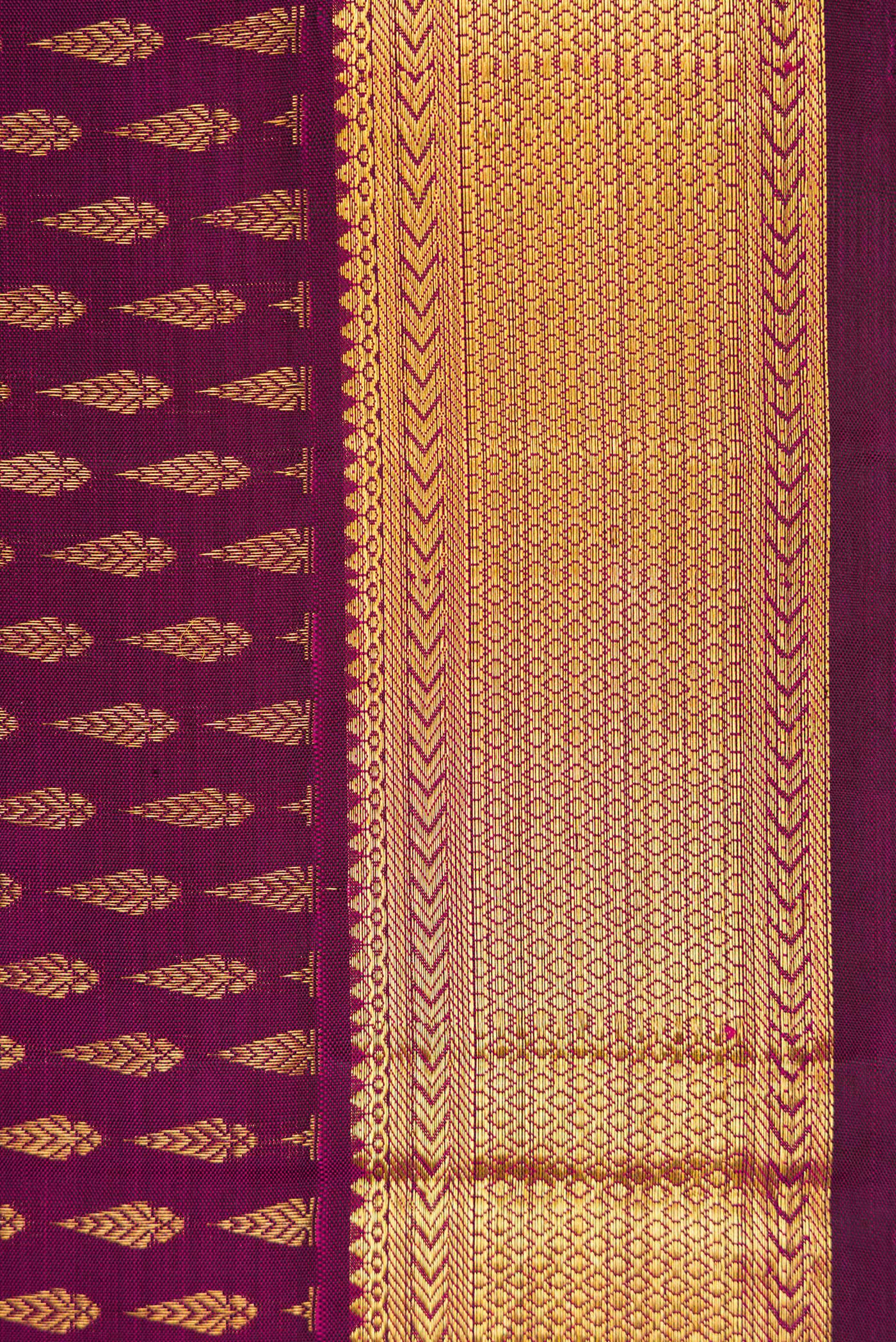 Border image of Magenta Dual Tone Kanjivaram Silk Saree with Zari Brocade on the body and Zari Border. 