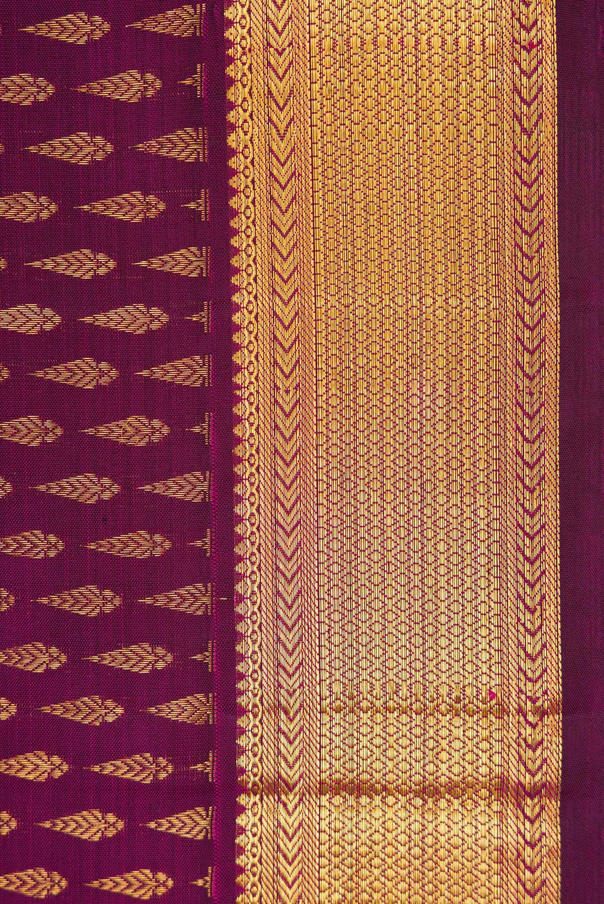 Border image of Magenta Dual Tone Kanjivaram Silk Saree with Zari Brocade on the body and Zari Border. 