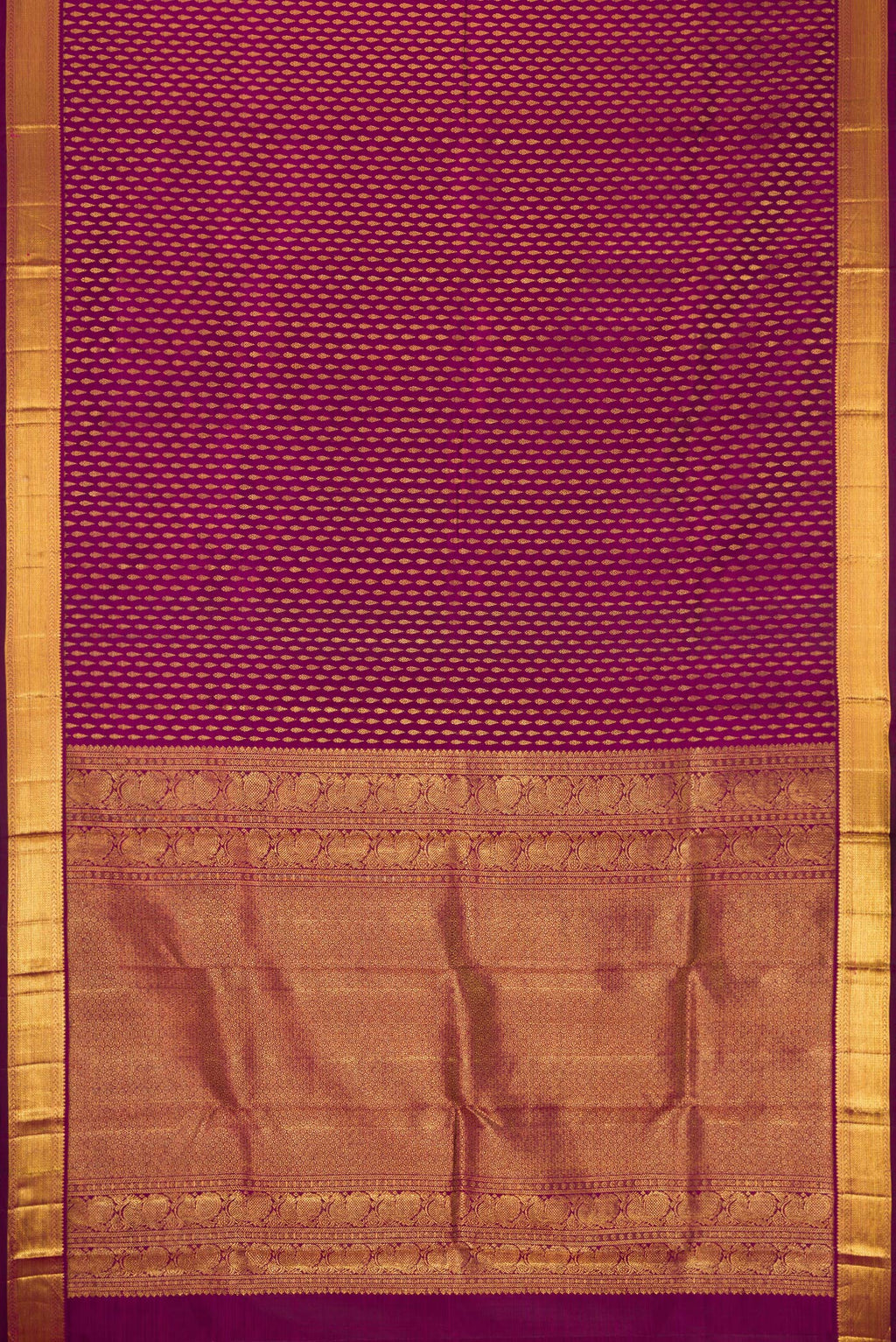 Flat view of Magenta Dual Tone Kanjivaram Silk Saree with Zari Brocade on the body and Zari Border. 
