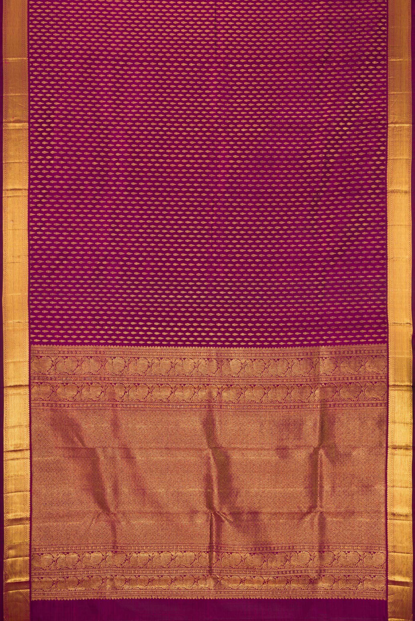 Flat view of Magenta Dual Tone Kanjivaram Silk Saree with Zari Brocade on the body and Zari Border. 