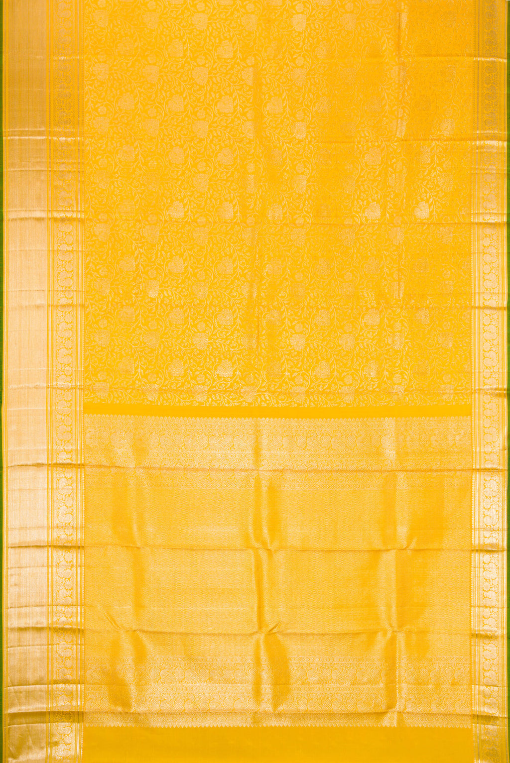 Flat view of Yellow Dual Tone Kanchipuram Silk Saree with Zari Brocade on the body and Zari Border. 