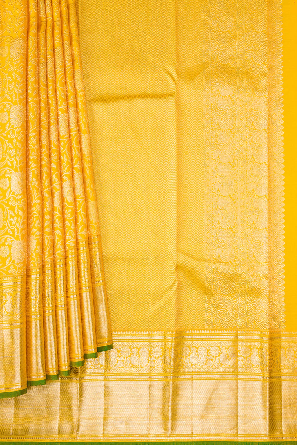 Pleats and pallu of Yellow Dual Tone Kanchipuram Silk Saree with Zari Brocade on the body and Zari Border. 