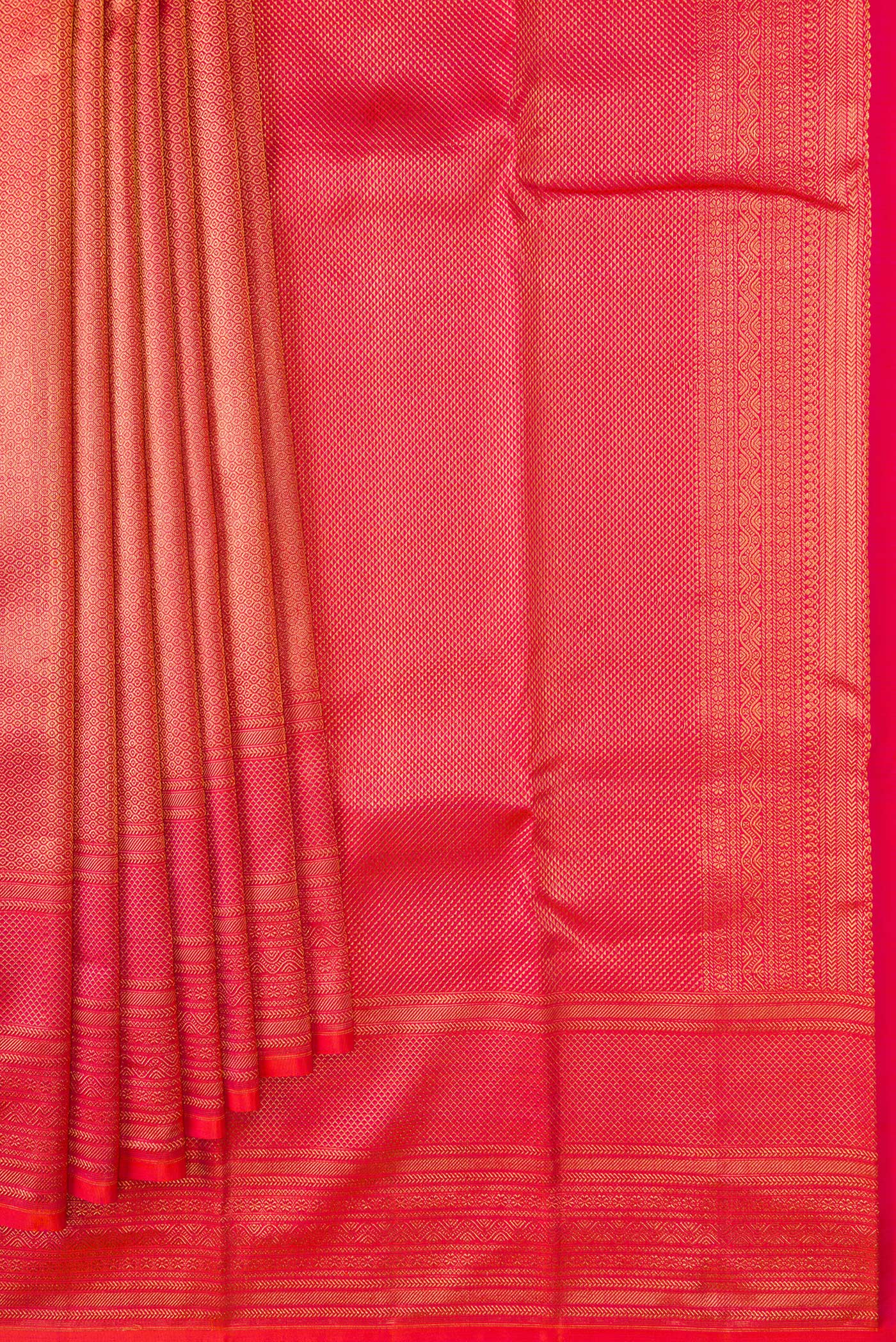 Pleats and pallu of Coral Dual Tone Kanchipuram Silk Saree with Zari Brocade on the body and Zari Border. 