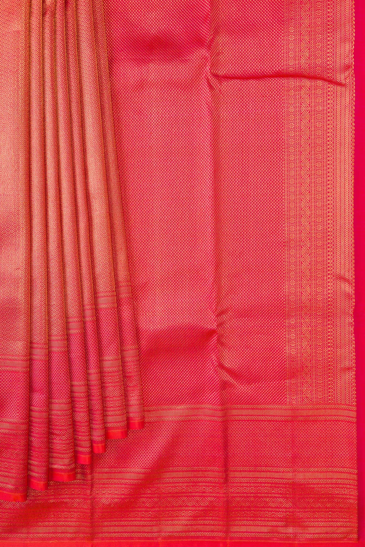 Pleats and pallu of Coral Dual Tone Kanchipuram Silk Saree with Zari Brocade on the body and Zari Border. 