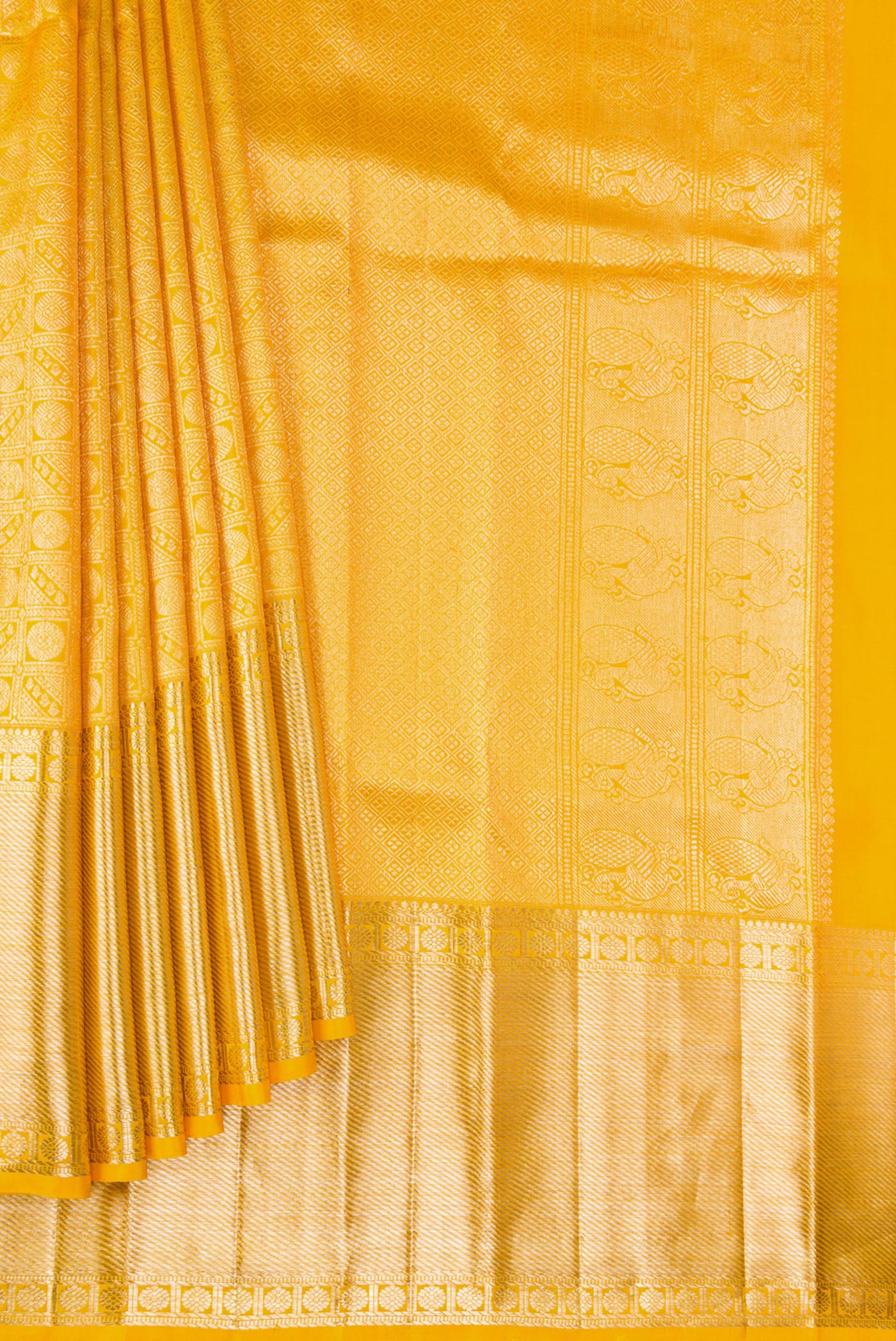Pleats and pallu of Yellow Dual Tone Kanchipuram Silk Saree with Zari Brocade on the body and Fancy Border. 