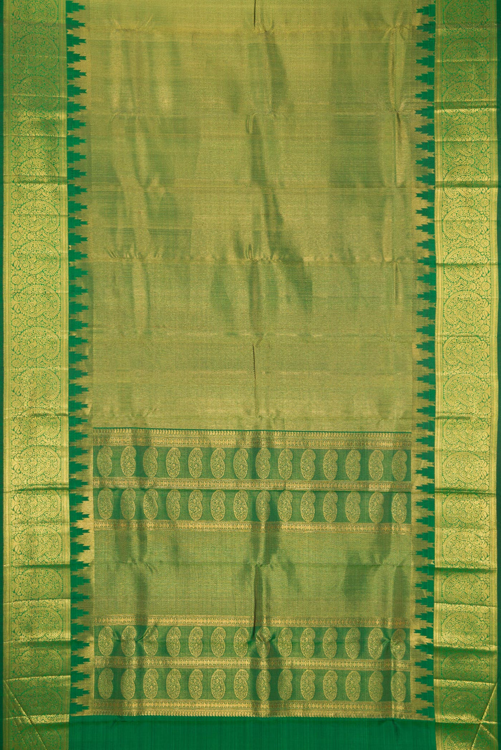 Flat view of Green Kanchipuram Silk Saree with Zari Brocade on the body and Zari Border. 
