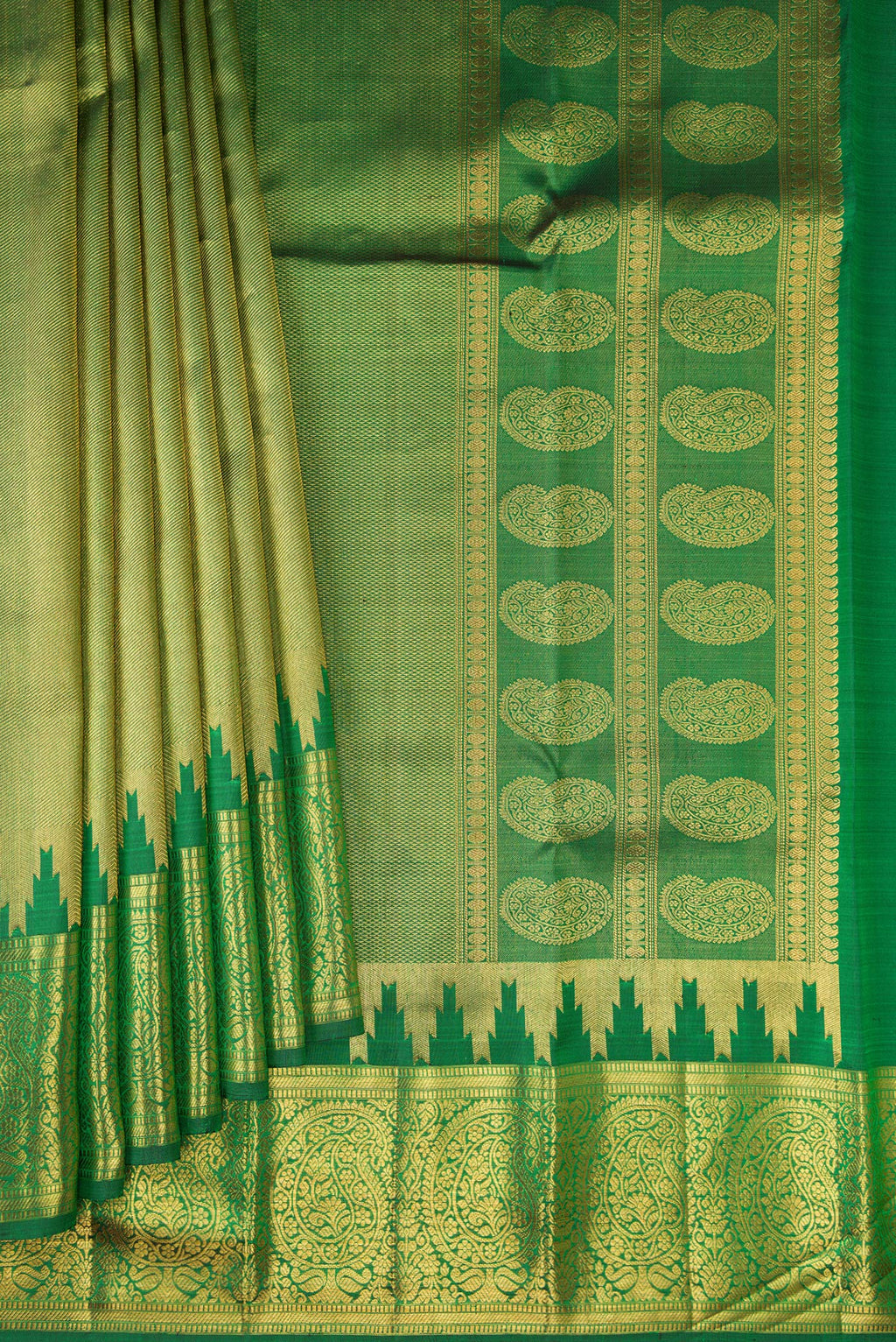 Pleats and pallu of Green Kanchipuram Silk Saree with Zari Brocade on the body and Zari Border. 