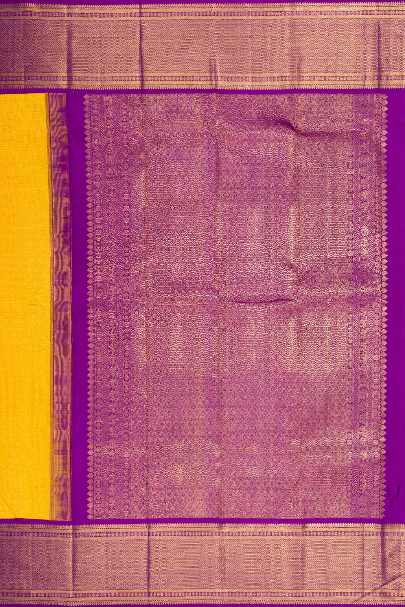 Close up image of the pallu of Yellow Dual Tone Kanchipuram Silk Saree with Zari Brocade on the body and Zari Border. 