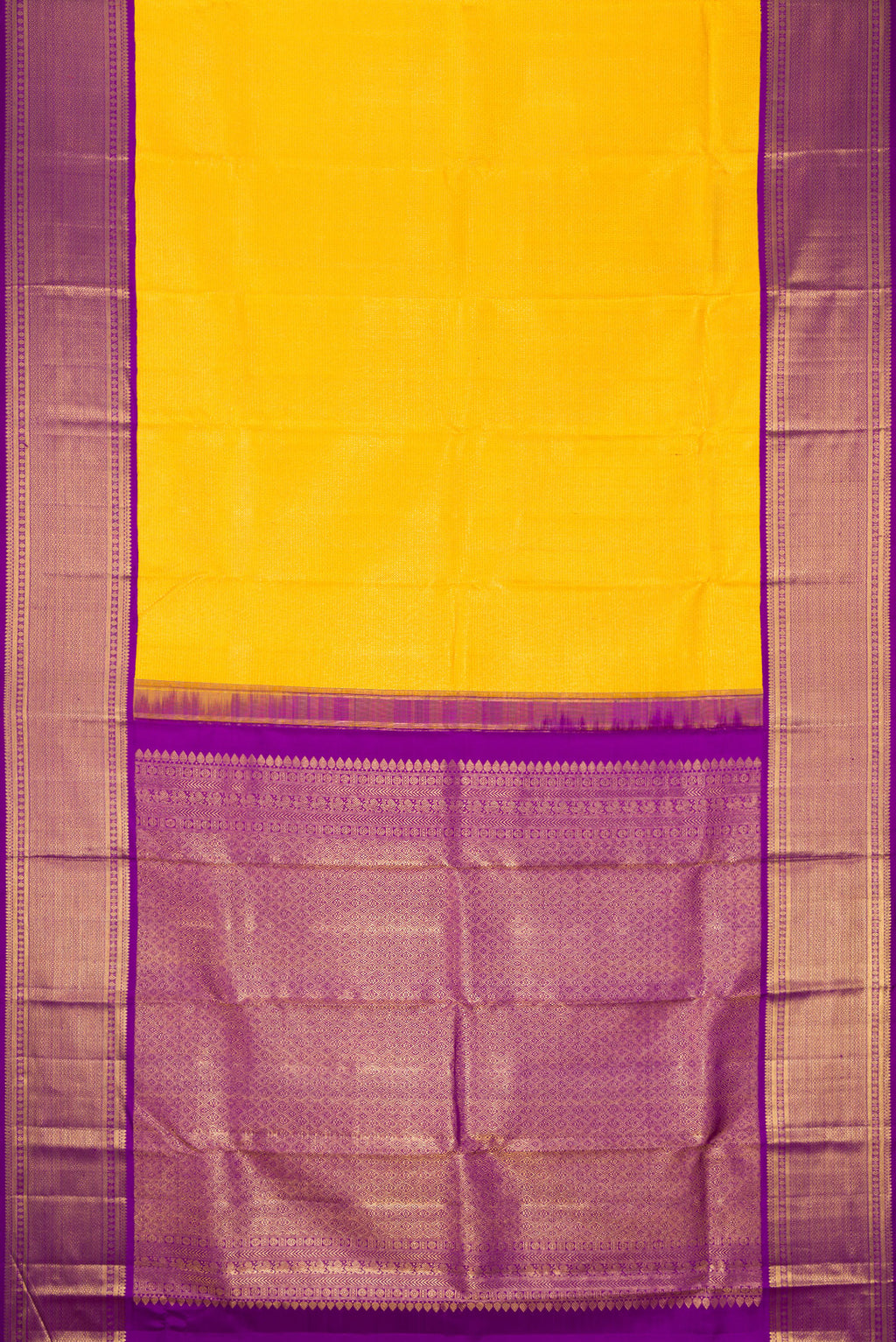 Flat view of Yellow Dual Tone Kanchipuram Silk Saree with Zari Brocade on the body and Zari Border. 