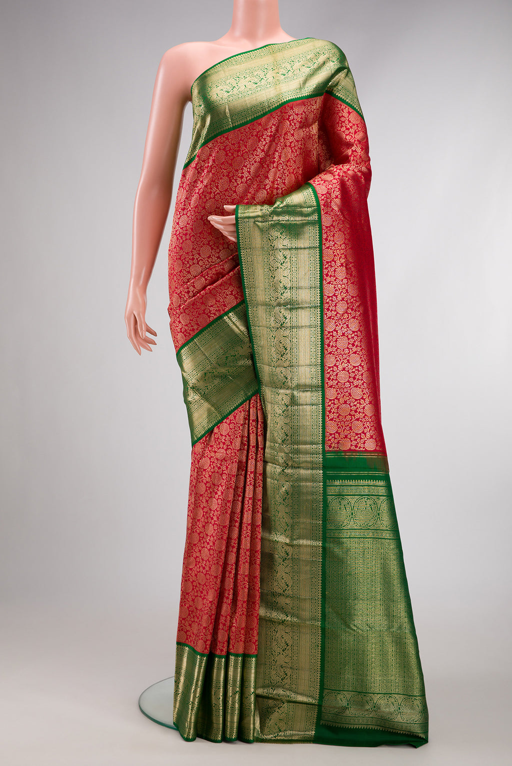Maroon Dual Tone Kanchipuram Silk Saree with Zari Brocade on the body and Zari Border.  displayed on a mannequin