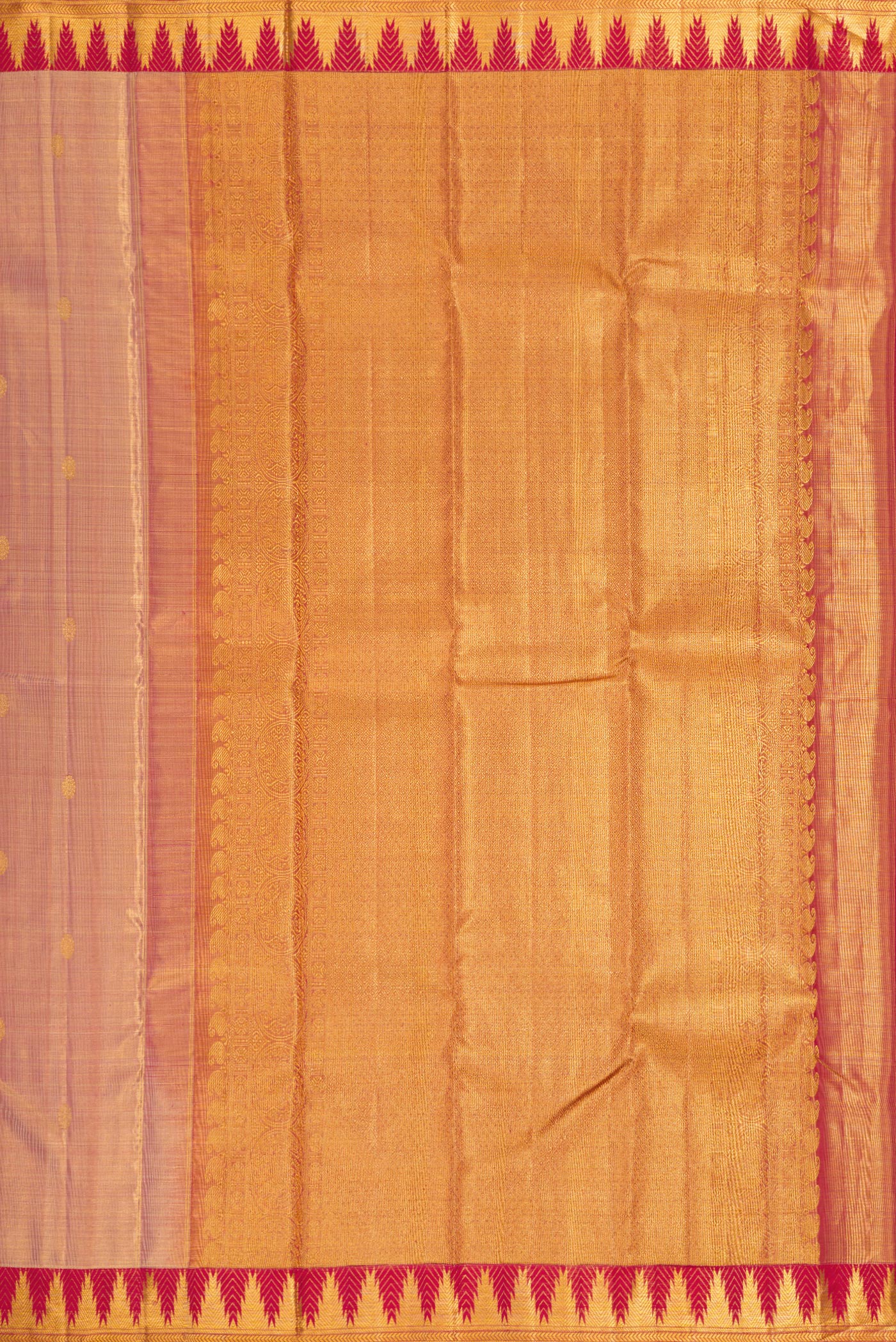 Close up image of the pallu of Rose Gold Dual Tone Kanchipuram Tissue Silk Saree with Zari Brocade on the body and Zari Border. 