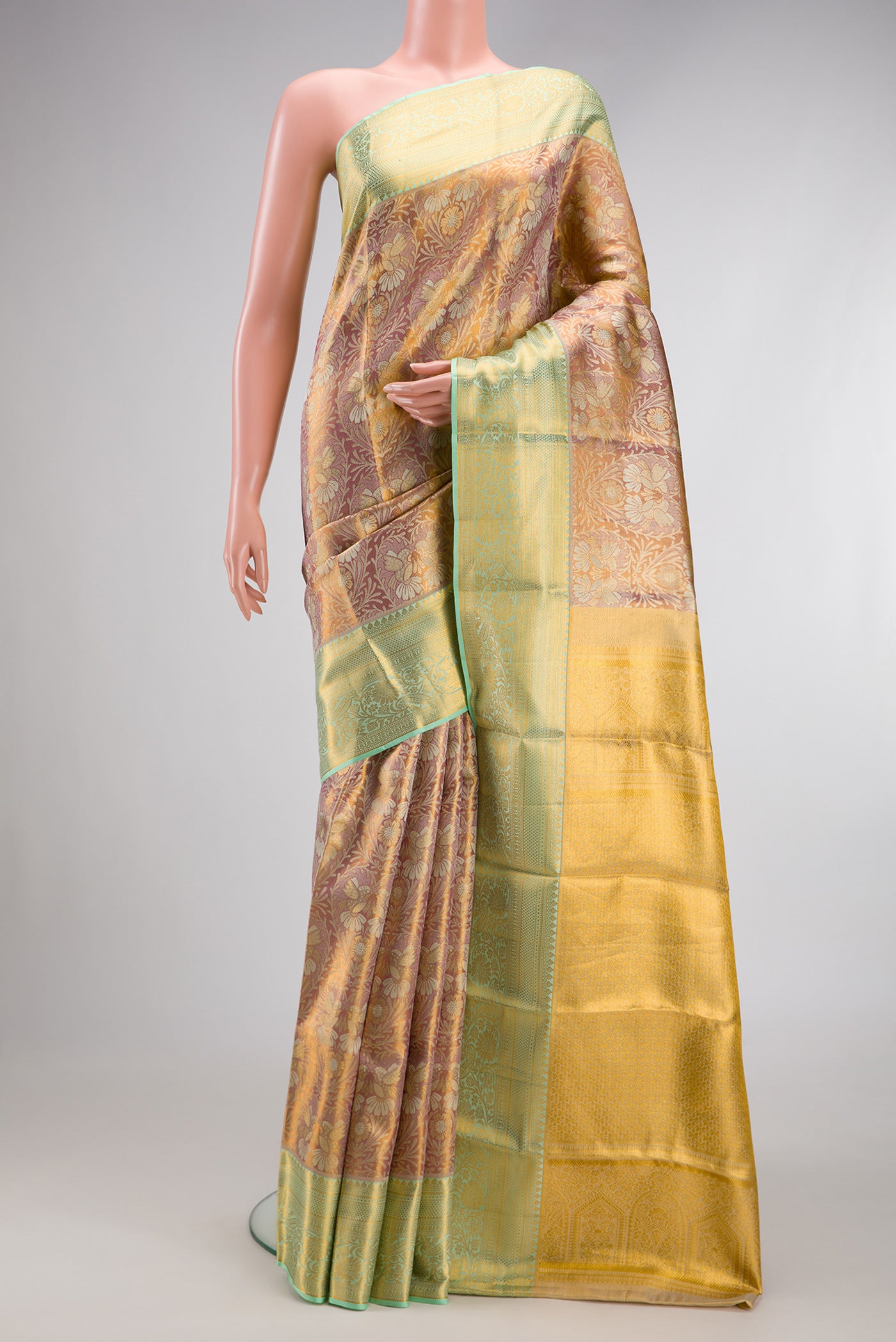 Rose Gold Dual Tone Kanchipuram Tissue Silk Saree with Zari Brocade on the body and Zari Border.  displayed on a mannequin