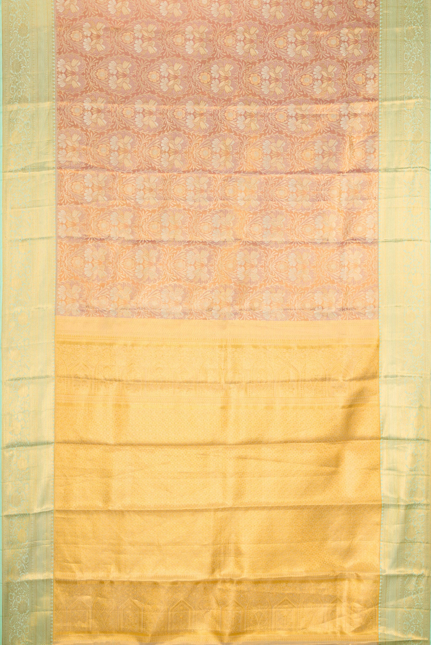 Flat view of Rose Gold Dual Tone Kanchipuram Tissue Silk Saree with Zari Brocade on the body and Zari Border. 