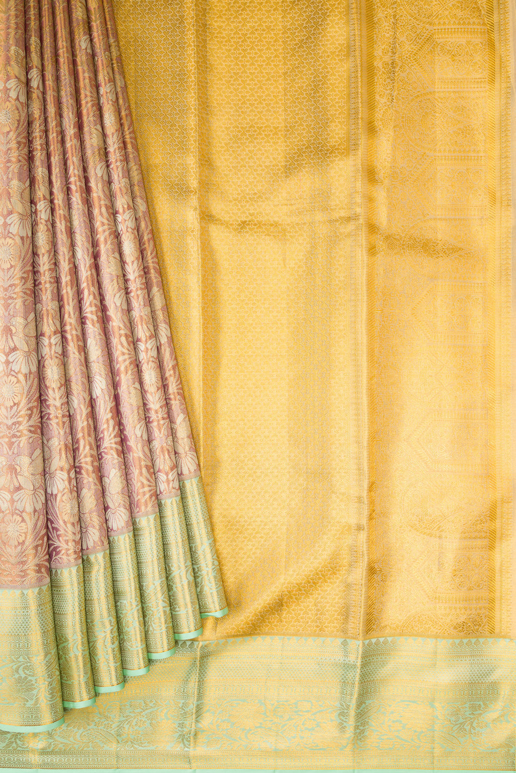 Pleats and pallu of Rose Gold Dual Tone Kanchipuram Tissue Silk Saree with Zari Brocade on the body and Zari Border. 