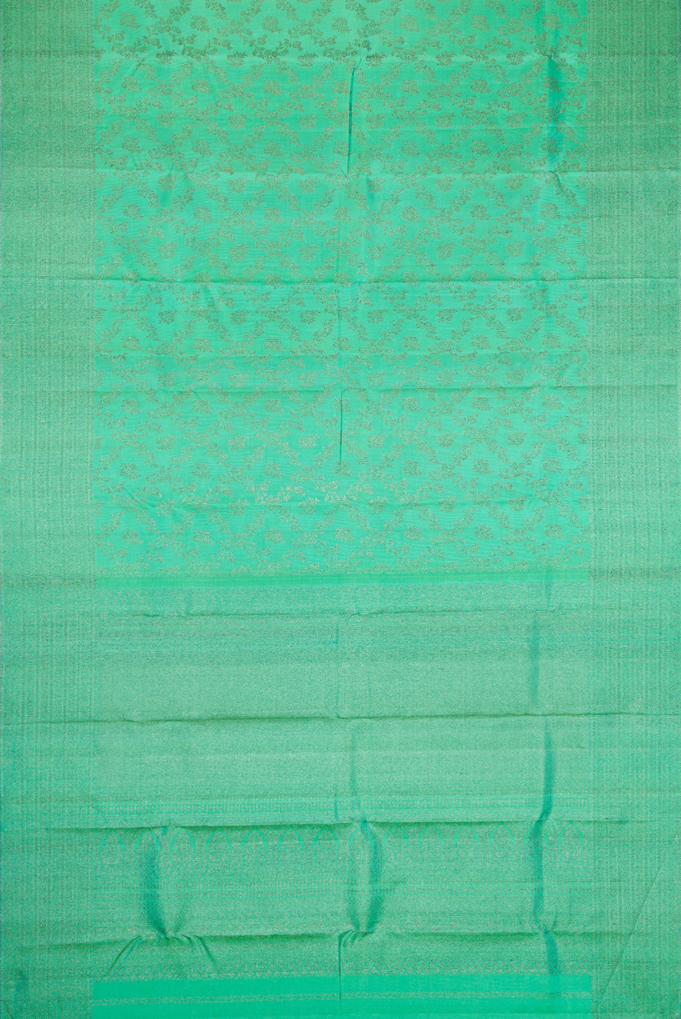Flat view of Sea Green Dual Tone Kanjivaram Silk Saree with Zari Brocade on the body and Zari Border. 