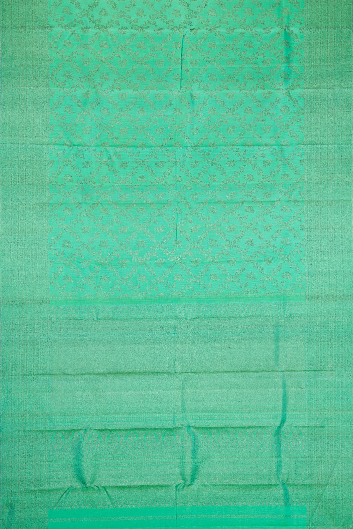 Flat view of Sea Green Dual Tone Kanjivaram Silk Saree with Zari Brocade on the body and Zari Border. 