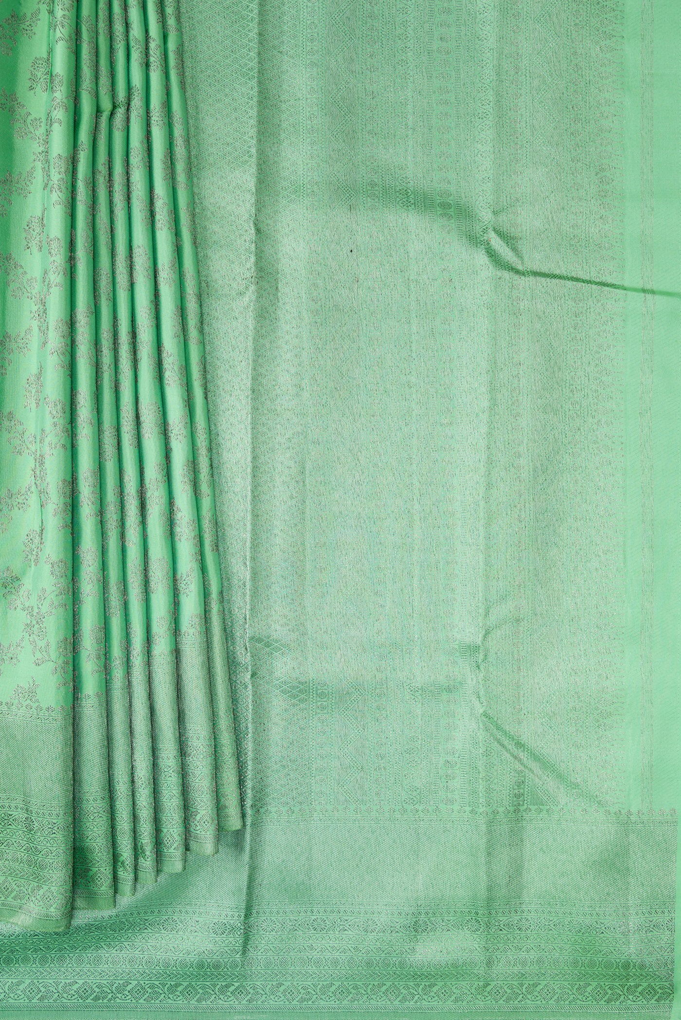 Pleats and pallu of Pista Green Dual Tone Kanjivaram Silk Saree with Zari Brocade on the body and Zari Border. 
