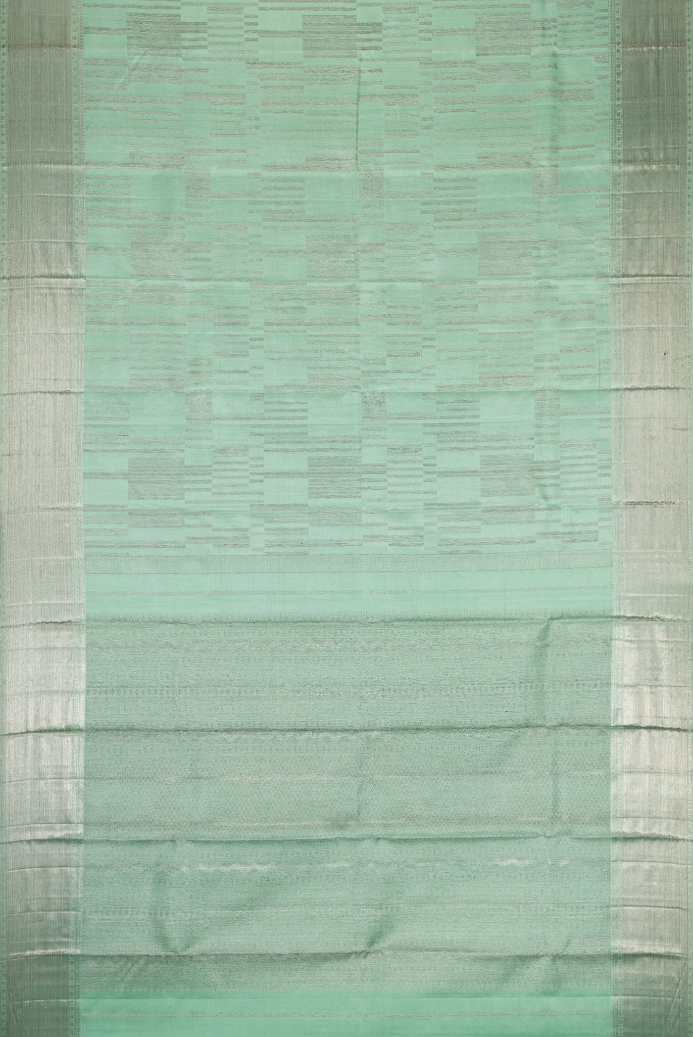 Flat view of Light Green Dual Tone Kanjivaram Silk Saree with Zari Brocade on the body and Zari Border. 