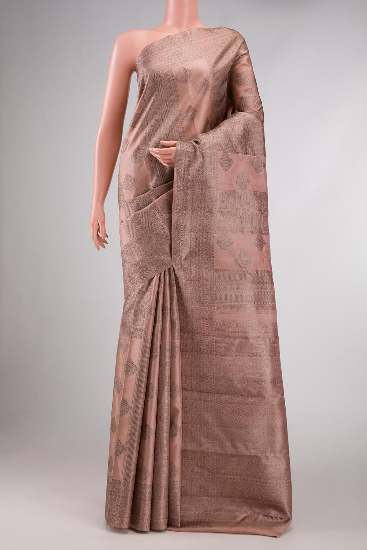 Golden Peach Dual Tone Kanchipuram Silk Saree with Zari Brocade on the body and Zari Border displayed on a mannequin
