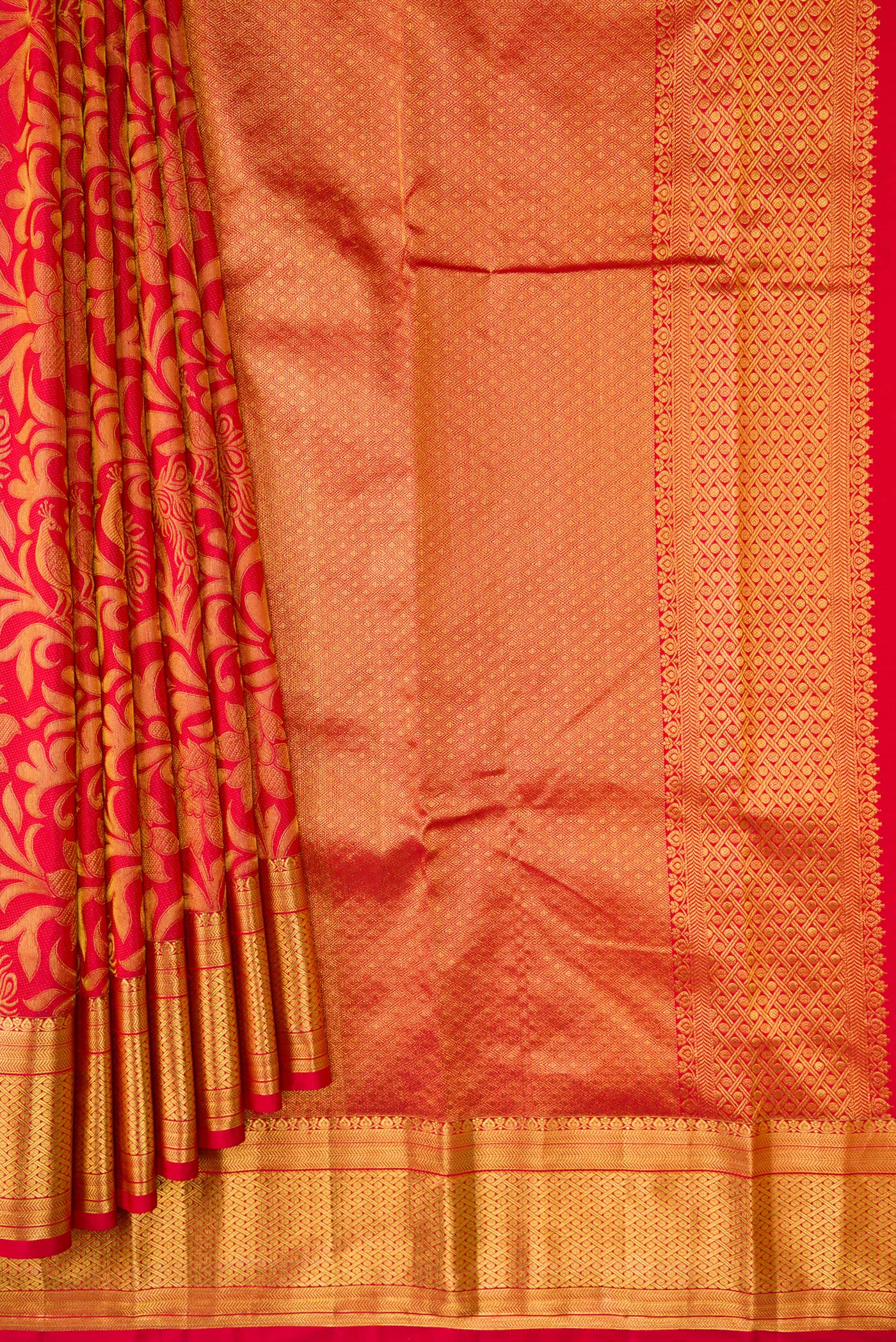 Pleats and pallu of Red Dual Tone Kanchipuram Silk Saree with Zari Brocade on the body and Zari Border. 