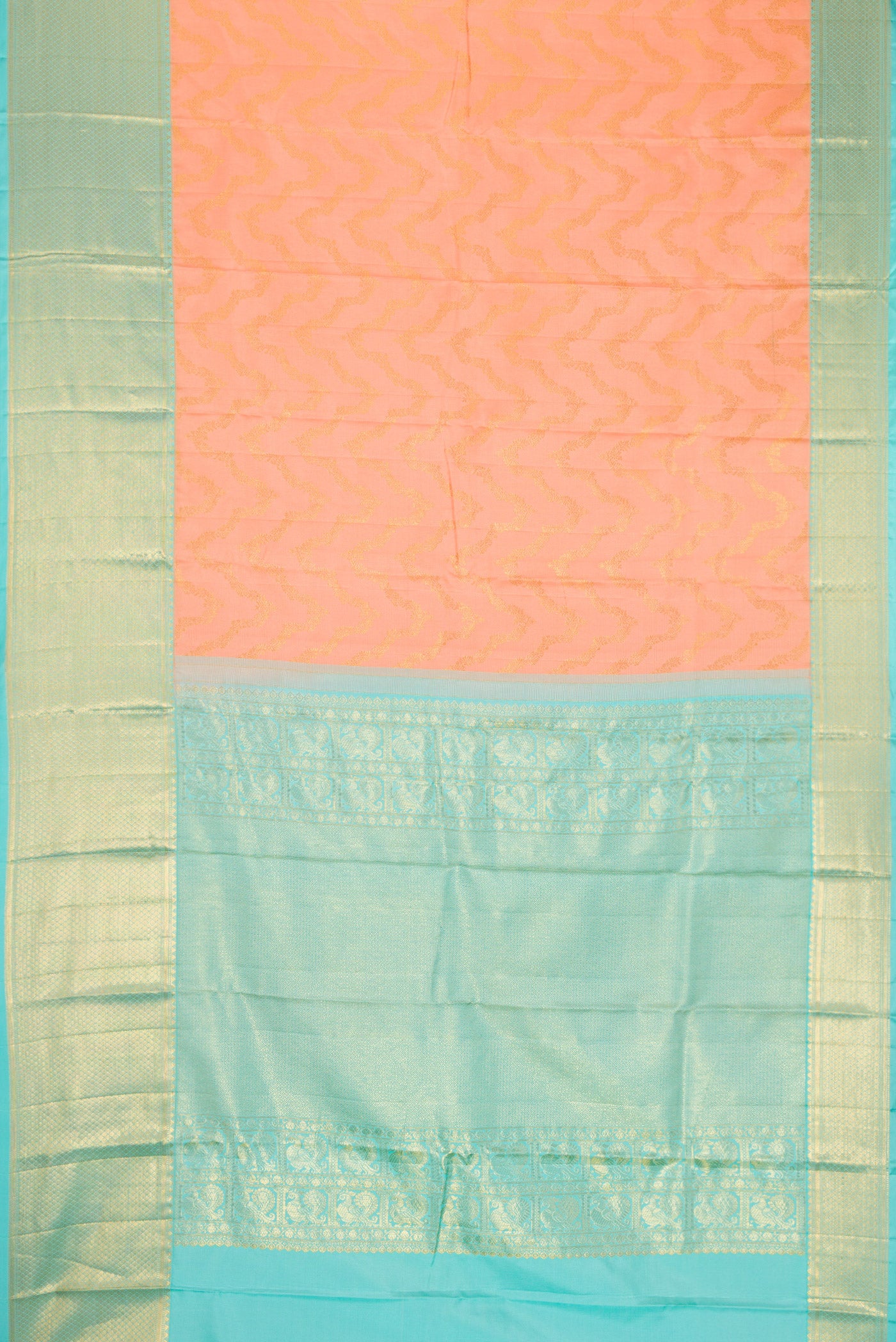 Flat view of Peach Dual Tone Kanjivaram Silk Saree with Zari Brocade on the body and Zari Border. 