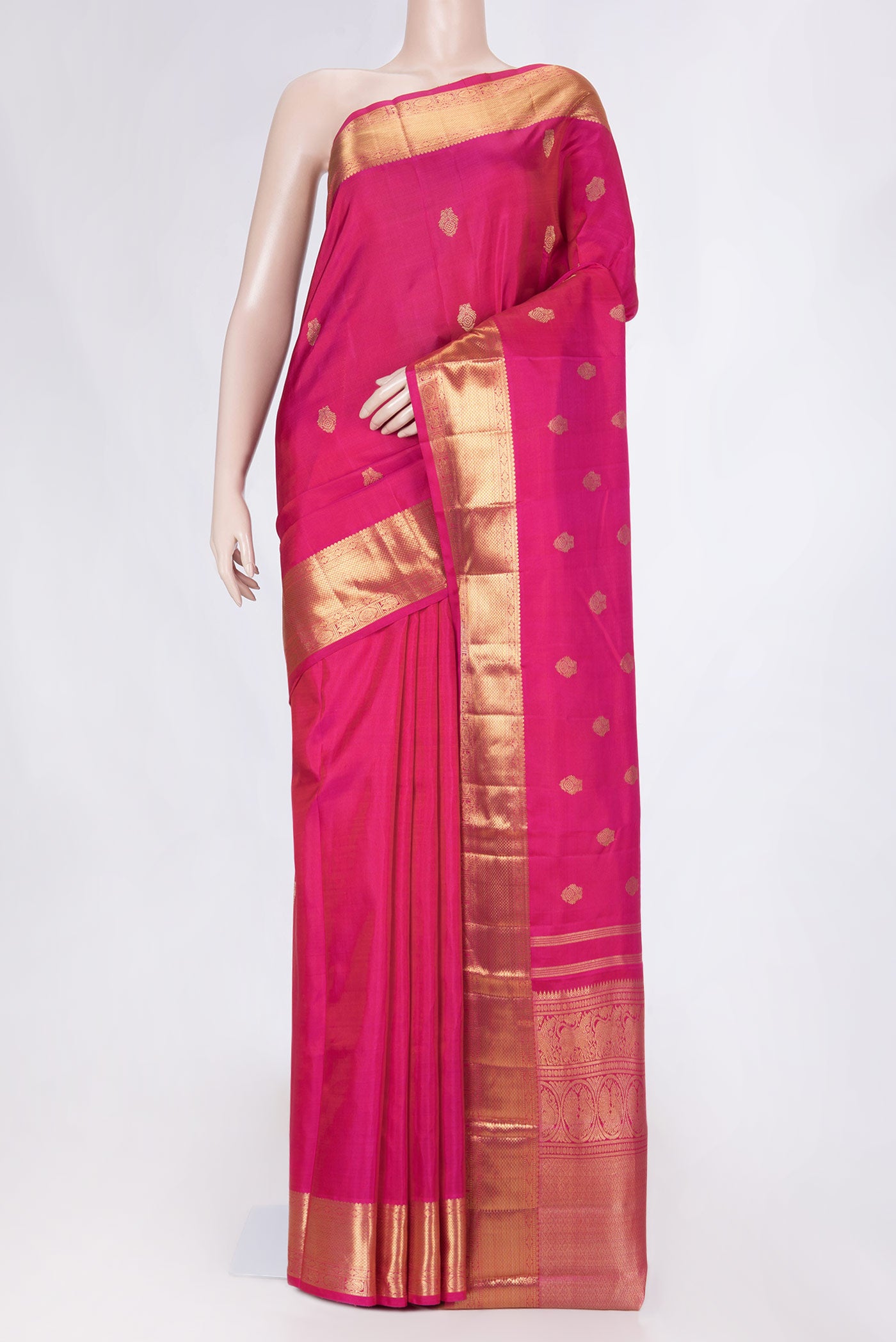 Pure Silk Pure Zari Dark Pink Dual Tone Kanchipuram Saree with Zari Butta on the body and Zari Border displayed on a mannequin