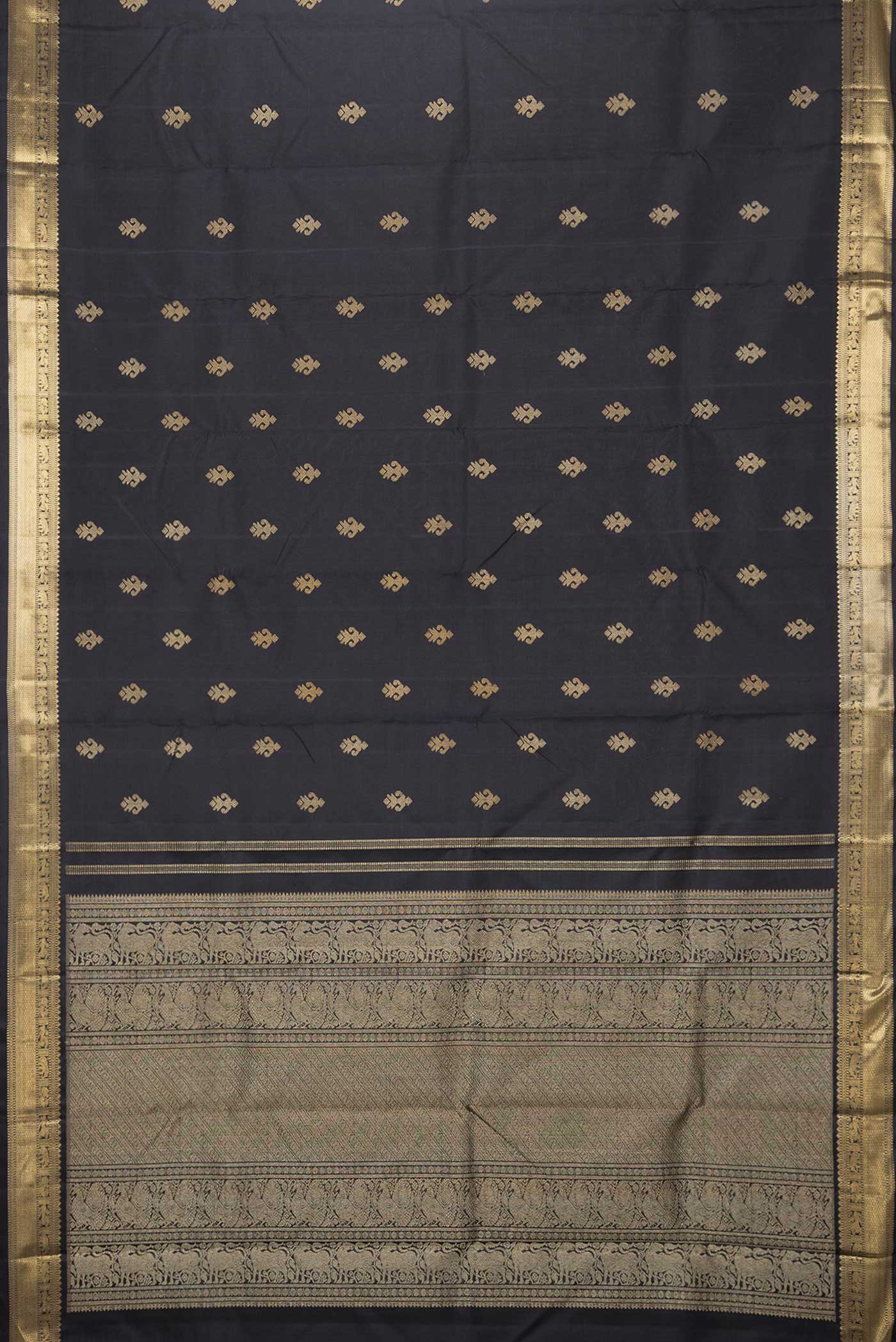 Flat view of Pure Silk Pure Zari Black Dual Tone Kanchipuram Saree with Zari Butta on the body and Zari Border
