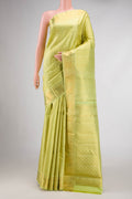 Parrot Green Dual Tone Kanchipuram Silk Saree with Zari Brocade on the body and Zari Border.  displayed on a mannequin