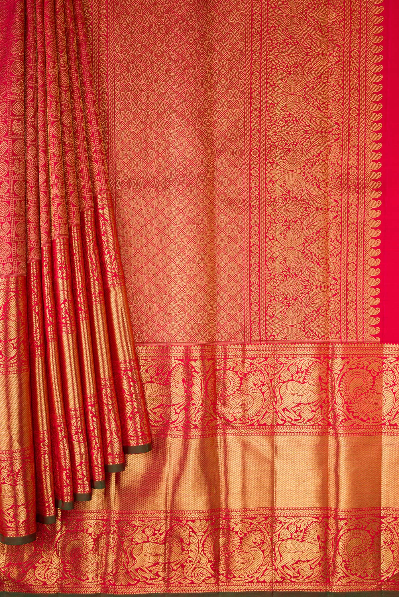 Pleats and pallu of Pure Silk Pure Zari Maroon Dual Tone Kanjivaram Saree with Zari Brocade on the body and Fancy Border. 