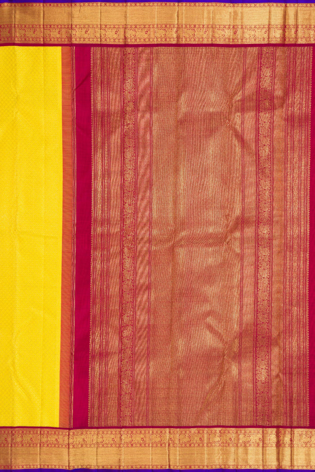 Close up image of the pallu of Pure Silk Pure Zari Yellow Dual Tone Kanjivaram Saree with Zari Brocade on the body and Zari Border. 
