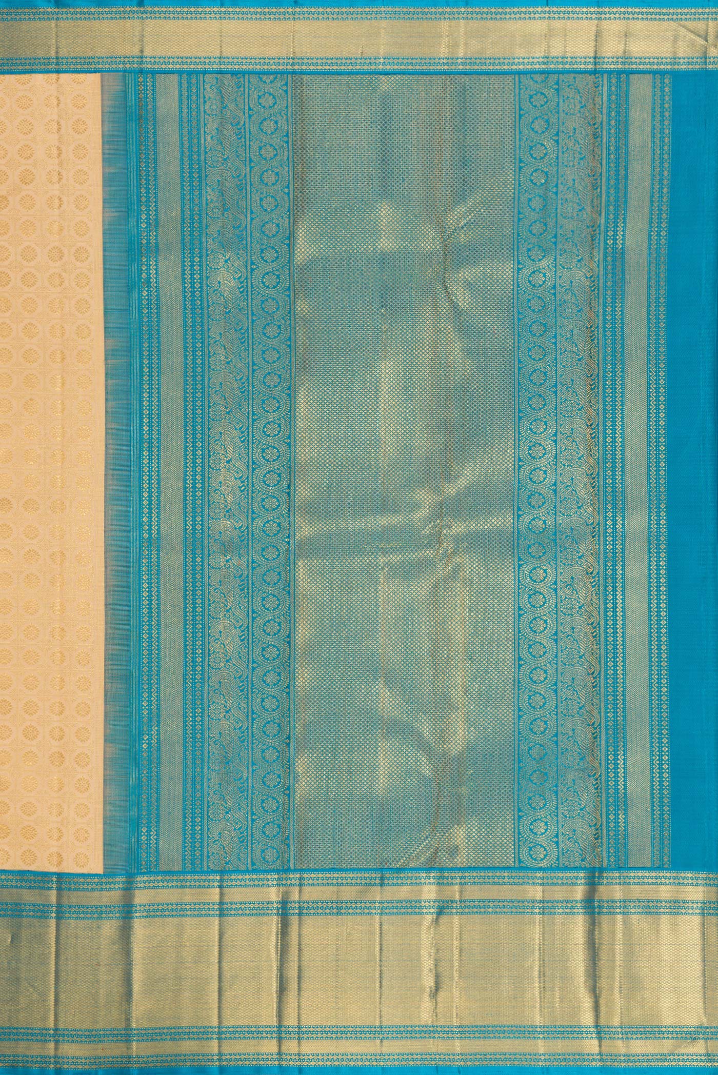 Close up image of the pallu of Pure Silk Pure Zari Beige Dual Tone Kanjivaram Saree with Zari Brocade on the body and Zari Border. 