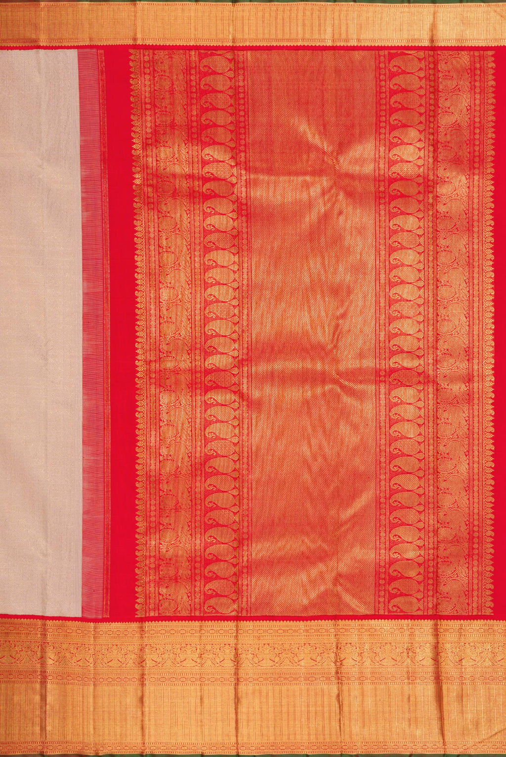 Close up image of the pallu of Pure Silk Pure Zari Rose Gold Dual Tone Kanjivaram Saree with Zari Brocade on the body and Zari Border. 