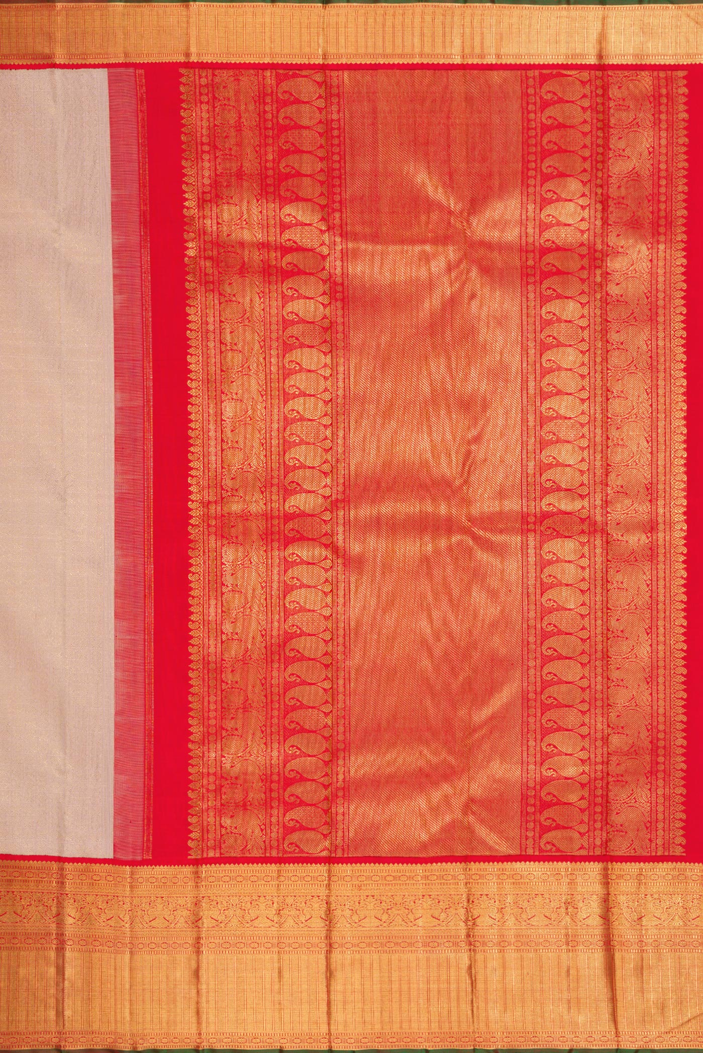 Close up image of the pallu of Pure Silk Pure Zari Rose Gold Dual Tone Kanjivaram Saree with Zari Brocade on the body and Zari Border. 