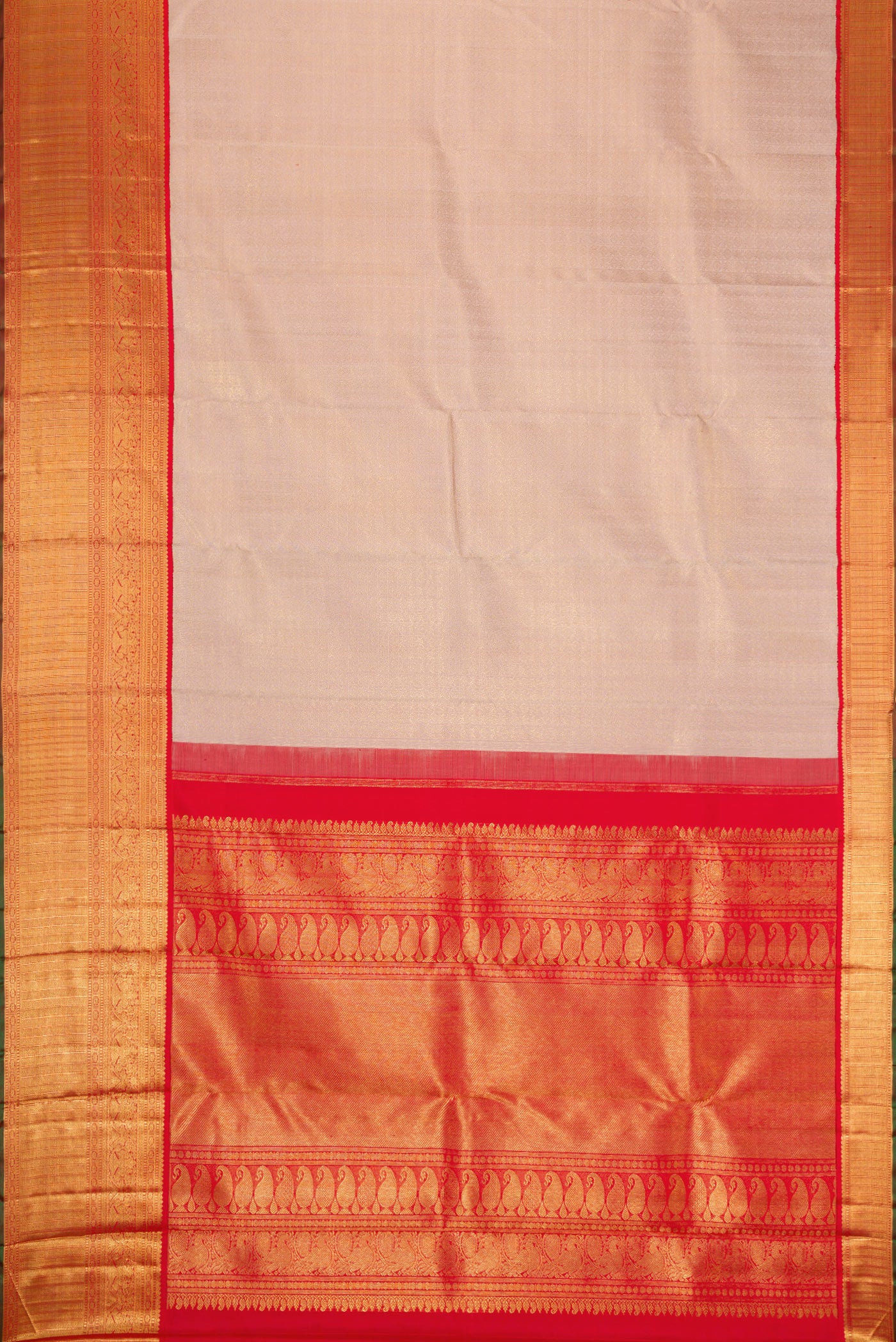 Flat view of Pure Silk Pure Zari Rose Gold Dual Tone Kanjivaram Saree with Zari Brocade on the body and Zari Border. 