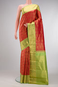 Pure Silk Pure Zari Red Dual Tone Kanjivaram Saree with Zari Brocade on the body and Zari Border.  displayed on a mannequin