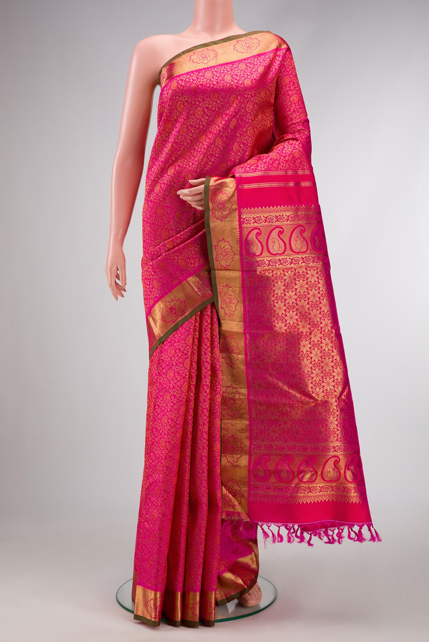 Pure Silk Pure Zari Pink Dual Tone Kanjivaram Saree with Zari Brocade on the body and Zari Border.  displayed on a mannequin