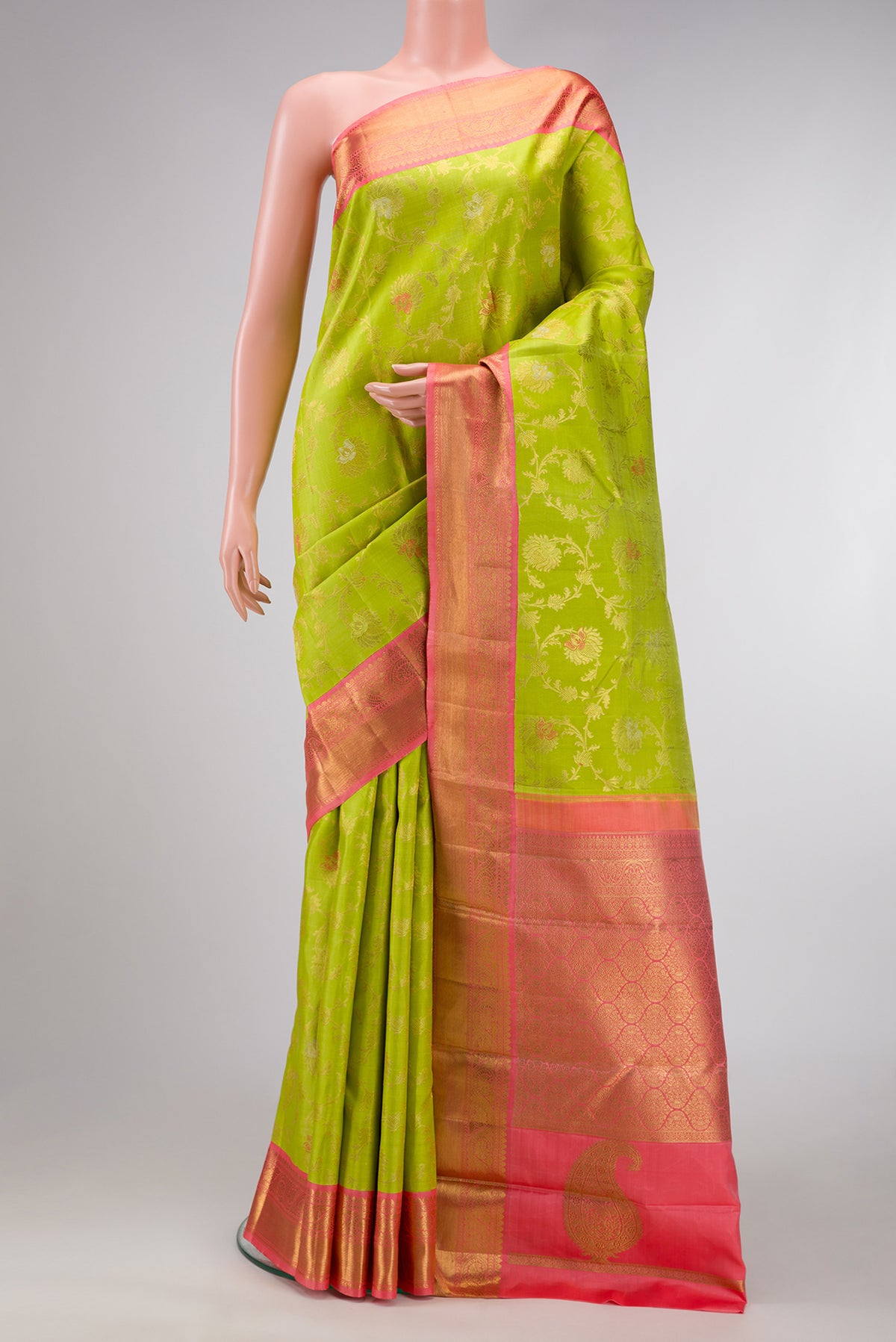 Pure Silk Pure Zari Parrot Green Dual Tone Kanjivaram Saree with Zari Brocade on the body and Zari Border.  displayed on a mannequin