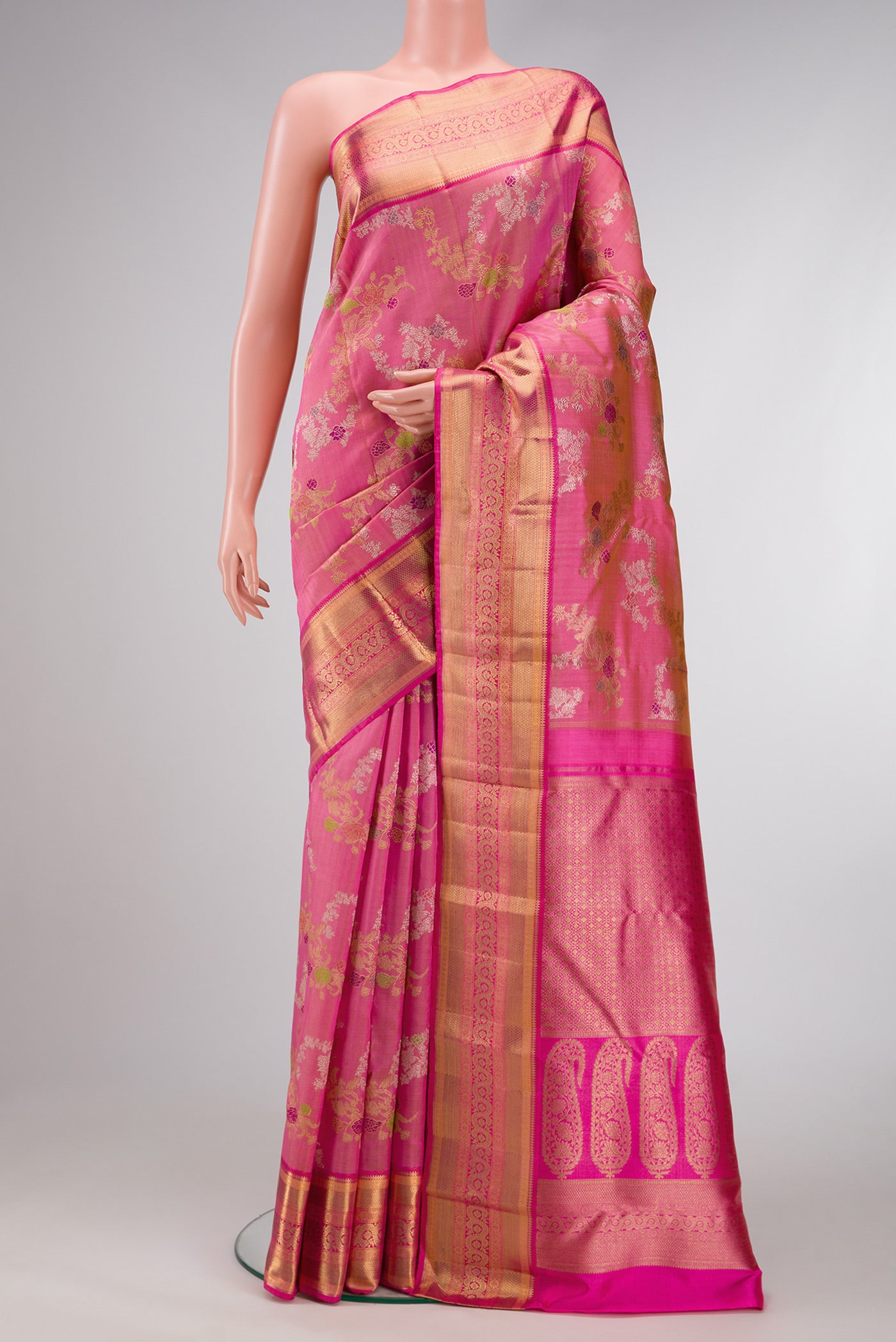 Pure Silk Pure Zari Pink Dual Tone Kanjivaram Saree with Zari Brocade on the body and Zari Border.  displayed on a mannequin
