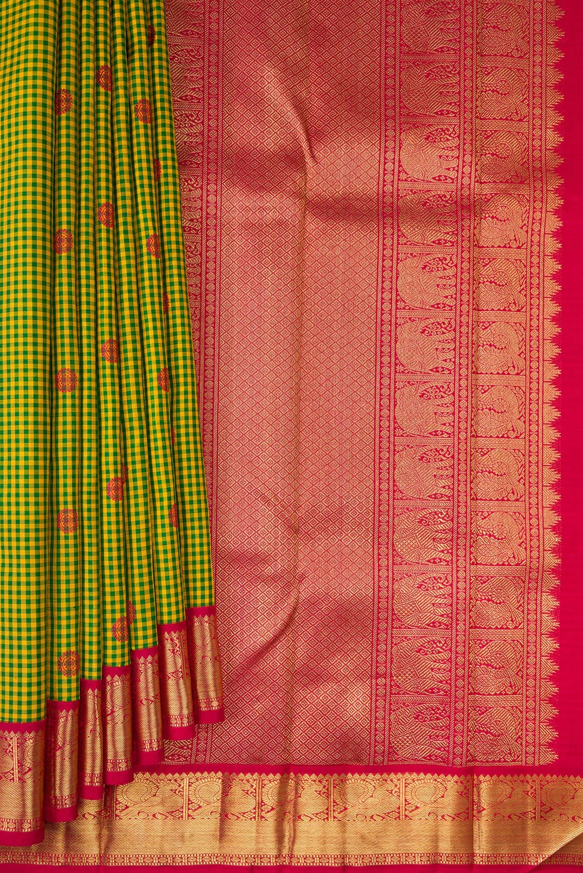 Pleats and pallu of Pure Silk Pure Zari Green Kanjivaram Saree with Checked design on the body and Zari Border. 