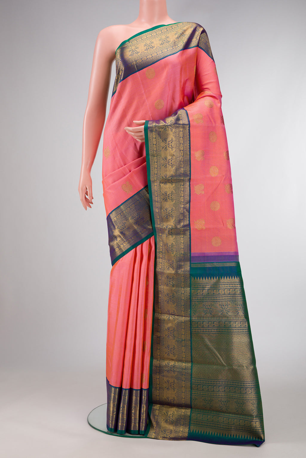 Pure Silk Pure Zari Pink Dual Tone Kanjivaram Saree with Zari Butta on the body and Zari Border.  displayed on a mannequin