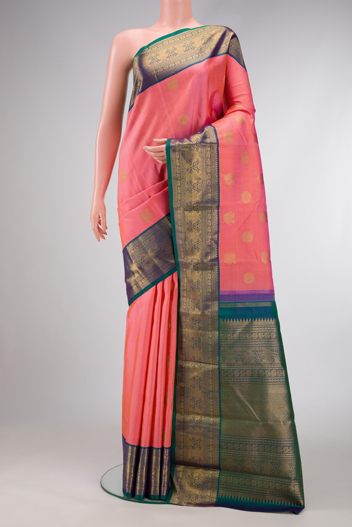 Pure Silk Pure Zari Pink Dual Tone Kanjivaram Saree with Zari Butta on the body and Zari Border.  displayed on a mannequin