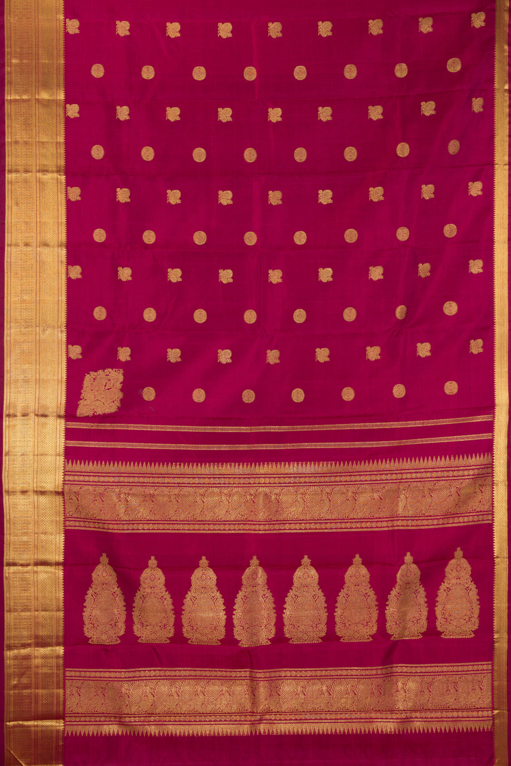 Flat view of Pure Silk Pure Zari Maroon Kanjivaram Saree with Zari Butta on the body and Zari Border. 