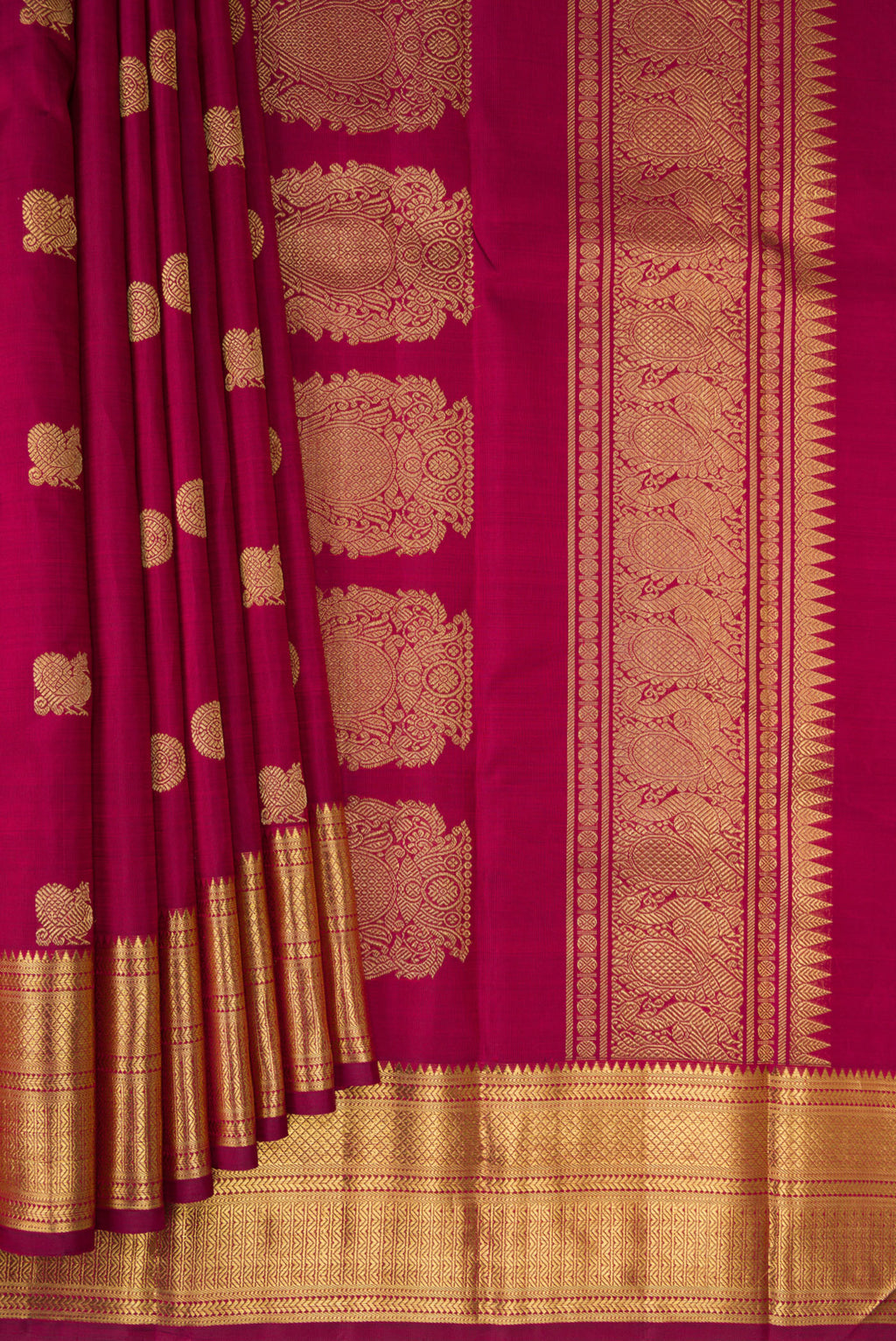 Pleats and pallu of Pure Silk Pure Zari Maroon Kanjivaram Saree with Zari Butta on the body and Zari Border. 