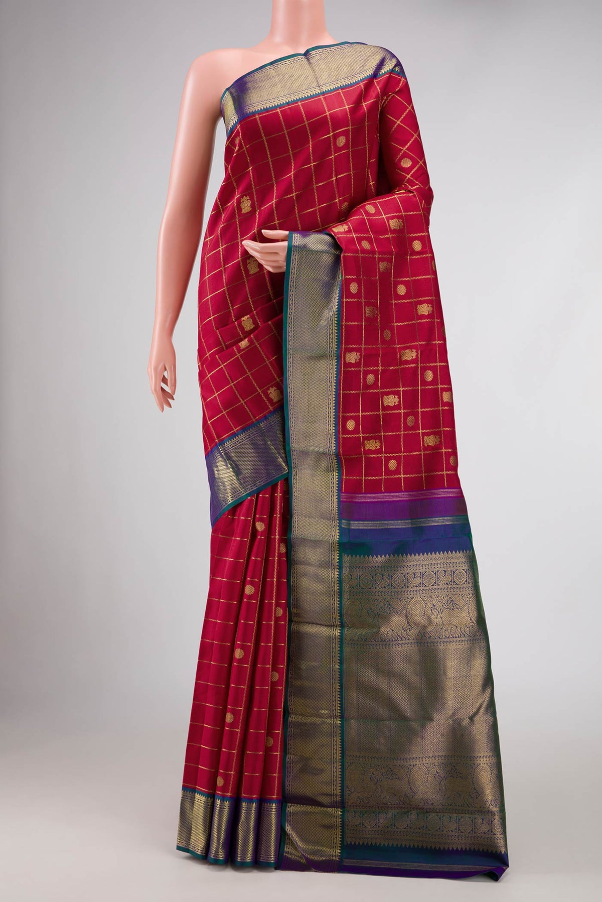 Pure Silk Pure Zari Maroon Dual Tone Kanchipuram Saree with Checked design on the body and Zari Border displayed on a mannequin