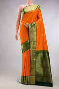 Pure Silk Pure Zari Orange Kanjivaram Saree with Zari Butta on the body and Zari Border.  displayed on a mannequin