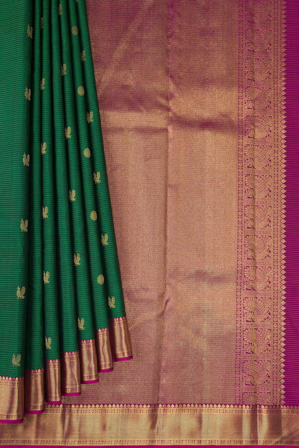 Pleats and pallu of Pure Silk Pure Zari Bottle Green Kanjivaram Saree with Stripes on the body and Zari Border. 