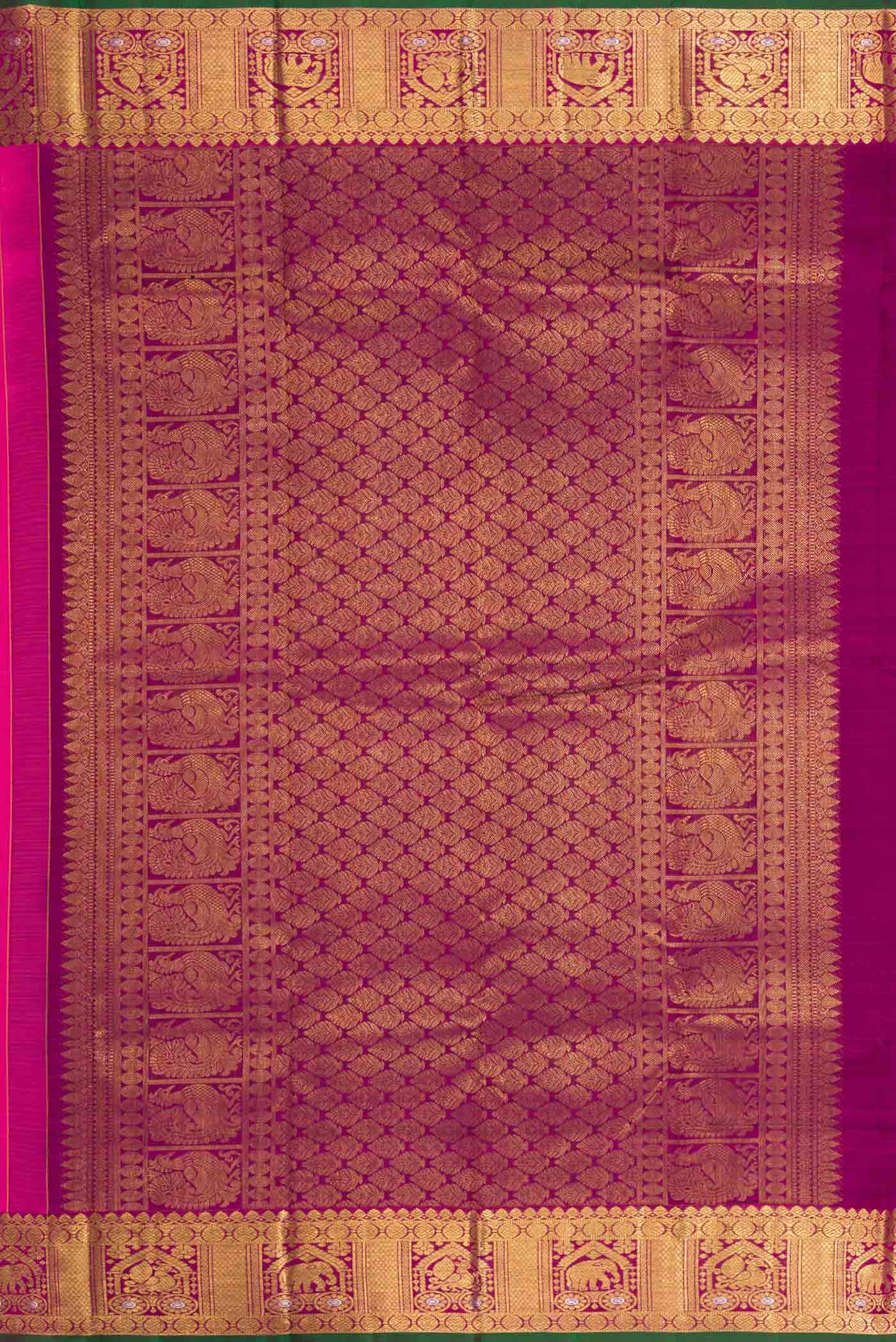 Close up image of the pallu of Pink Kanchipuram Silk Saree with Zari Butta on the body and Zari Border