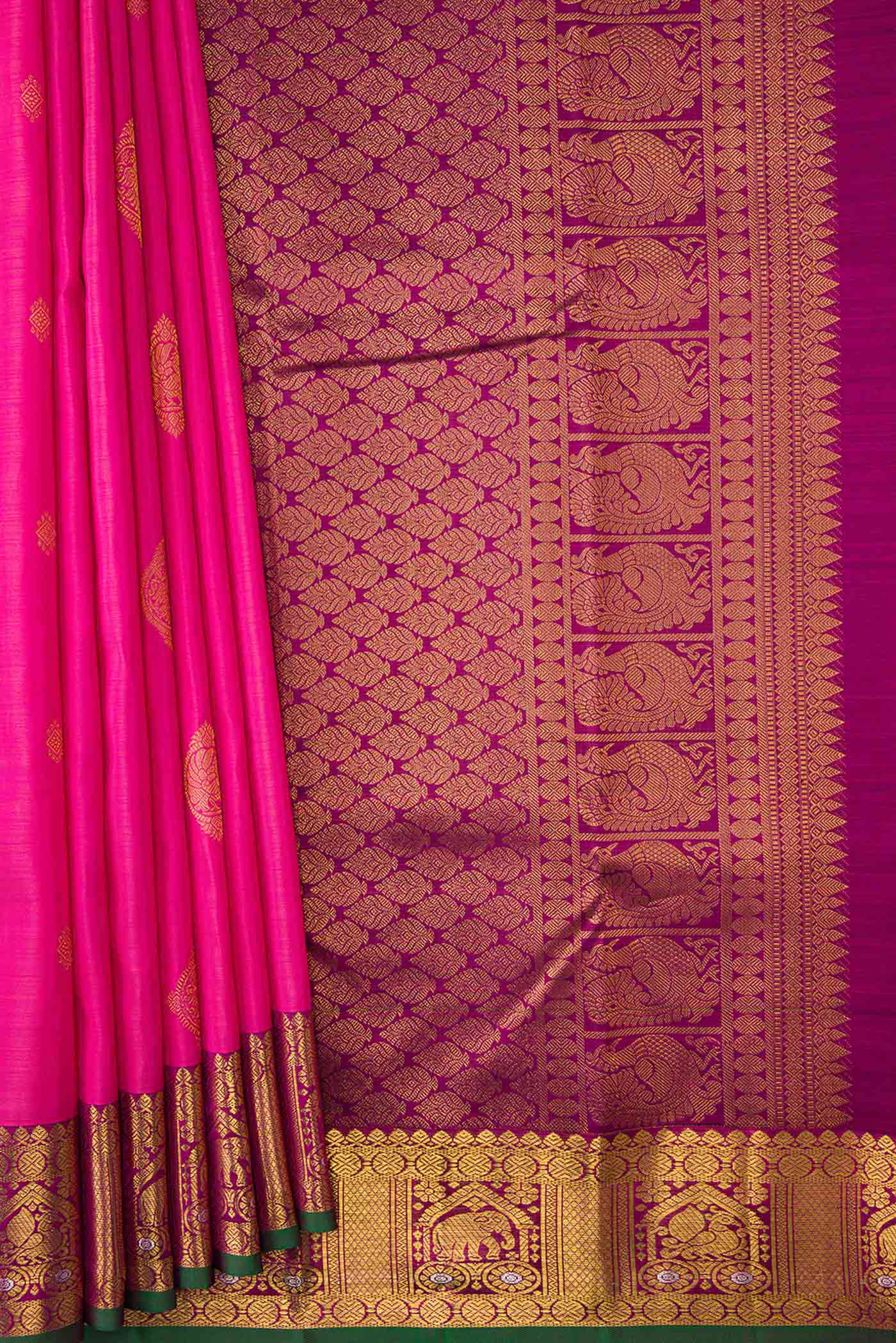 Pleats and pallu of Pink Kanchipuram Silk Saree with Zari Butta on the body and Zari Border