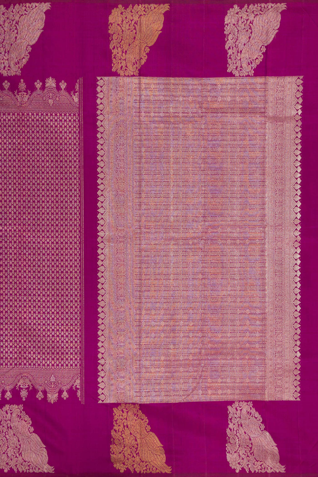 Close up image of the pallu of Magenta Kanchipuram Silk Saree with Zari Brocade on the body and Fancy Border. 
