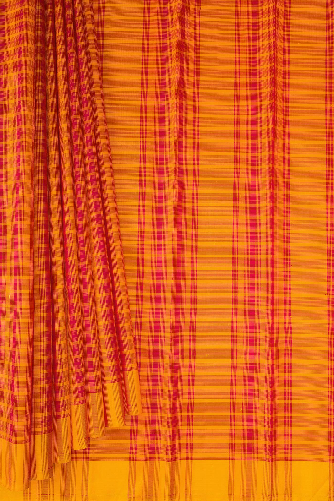 Pleats and pallu of Orange Kanchipuram Silk Saree with Checked design on the body and Thread Border. 